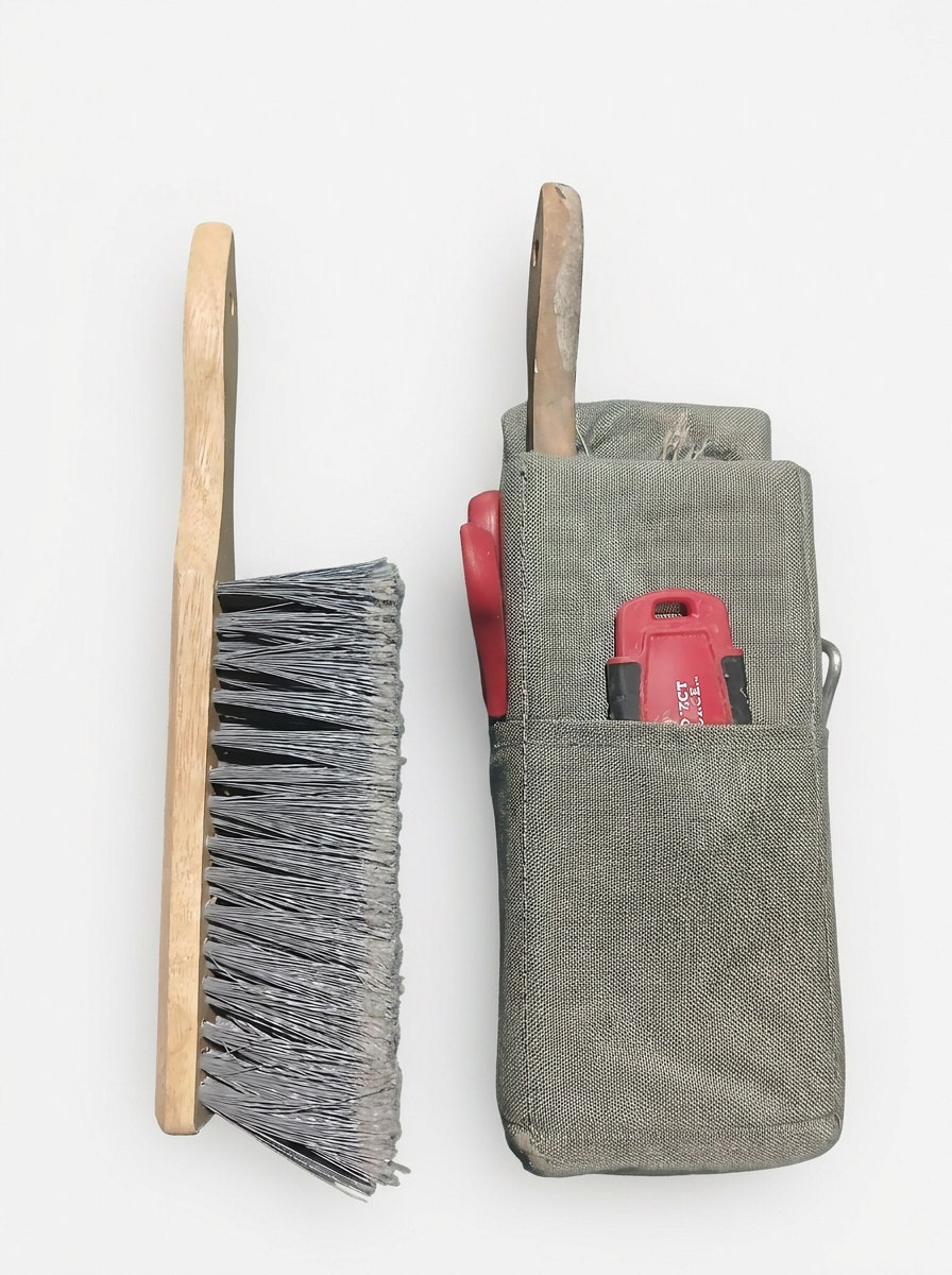 Cosmo Painter Belt‑Mounted Broom Pouch made from heavy‑duty Nylon Cordura with polycarbonate back‑panel reinforcement.