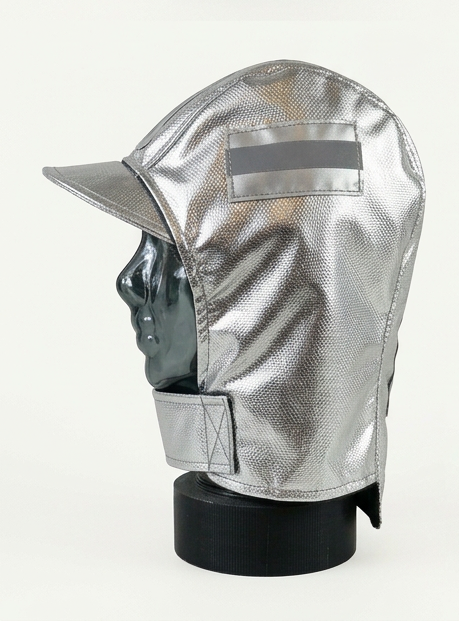A metallic silver protective hood with a visor and chin strap, displayed on a black mannequin head against a plain light background.