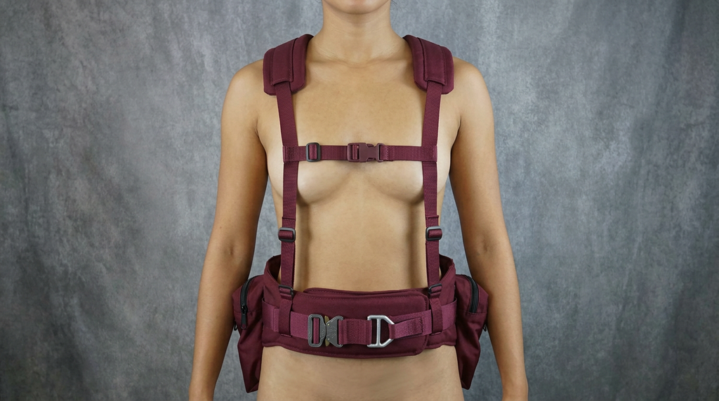 The Ravin Load‑Bearing Backbrace Harness combines a heavy‑duty padded back brace belt with a fully integrated H‑harness suspender system